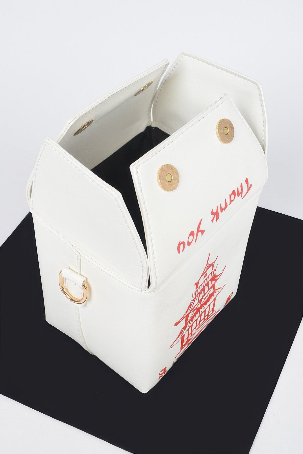 White Chinese To Go Box Clutch open view showing magnetic flap closure and interior