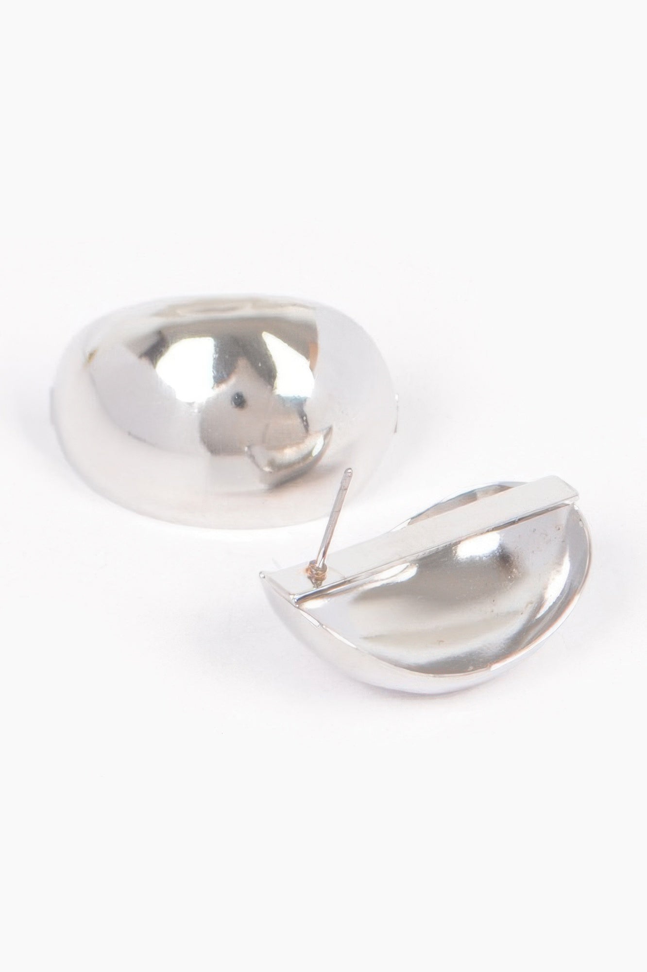 Compact polished sculptural metal earrings, product view 3