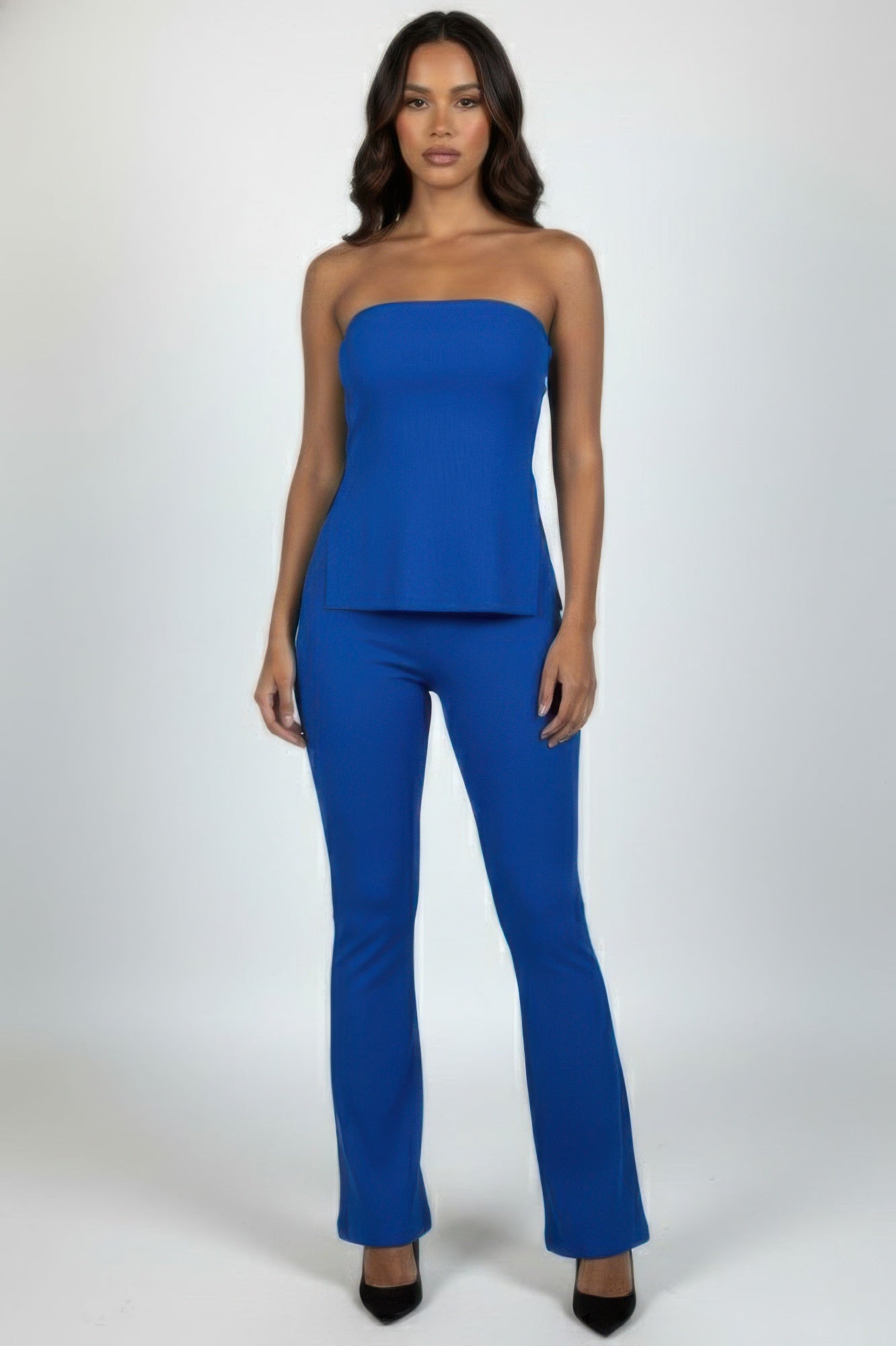 Front view of the royal blue strapless ribbed slit tube top and high-waist flare pants set
