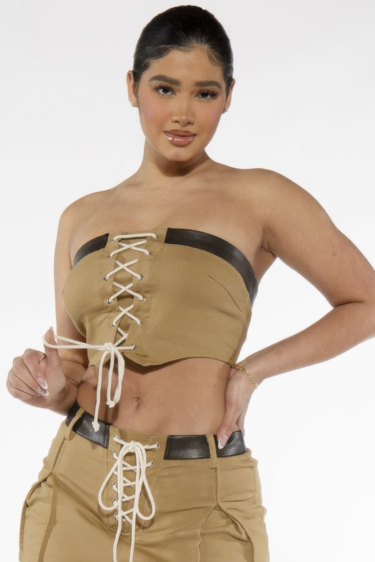 Angled front view of the khaki Desert Laced Corset Top and adjustable lace-up detail