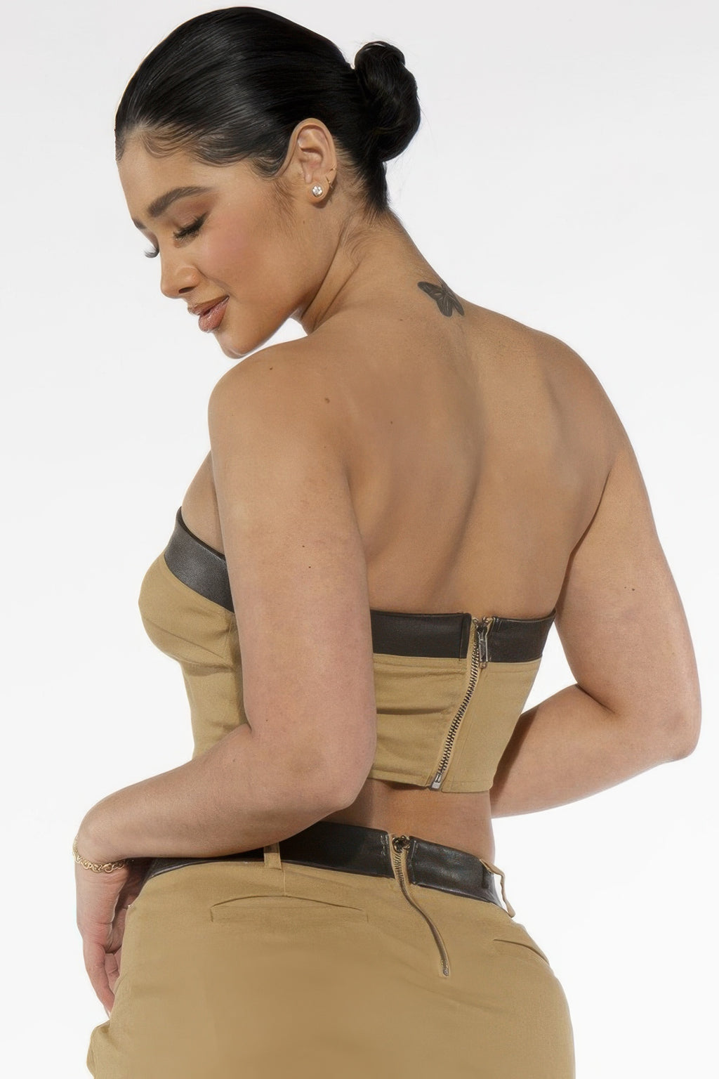 Back view of the khaki Desert Laced Corset Top showing center zipper and black upper band