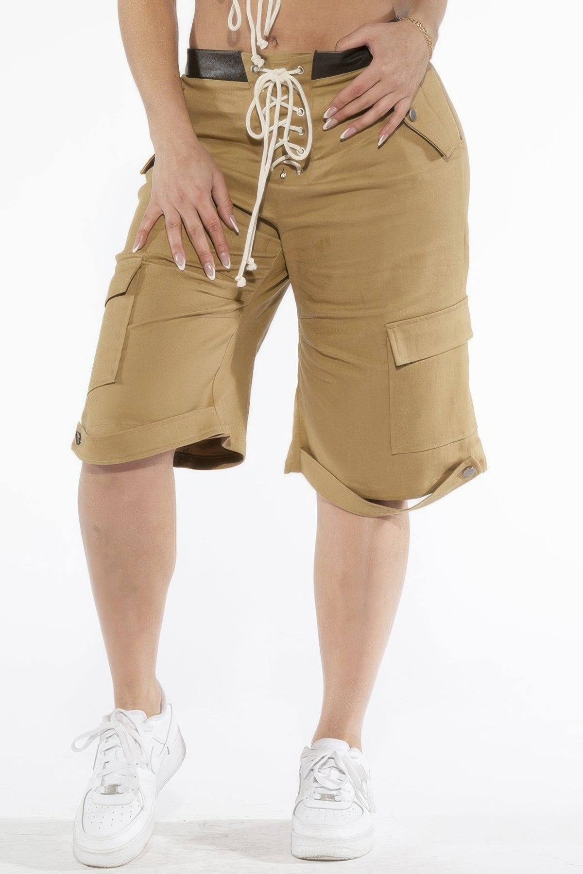 Close front view of the khaki cargo Bermuda shorts lace-up waist and pocket details