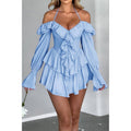 Blue Reign Ruffle Mini Dress in powder blue, full front view with off-shoulder ruffle and tiered skirt