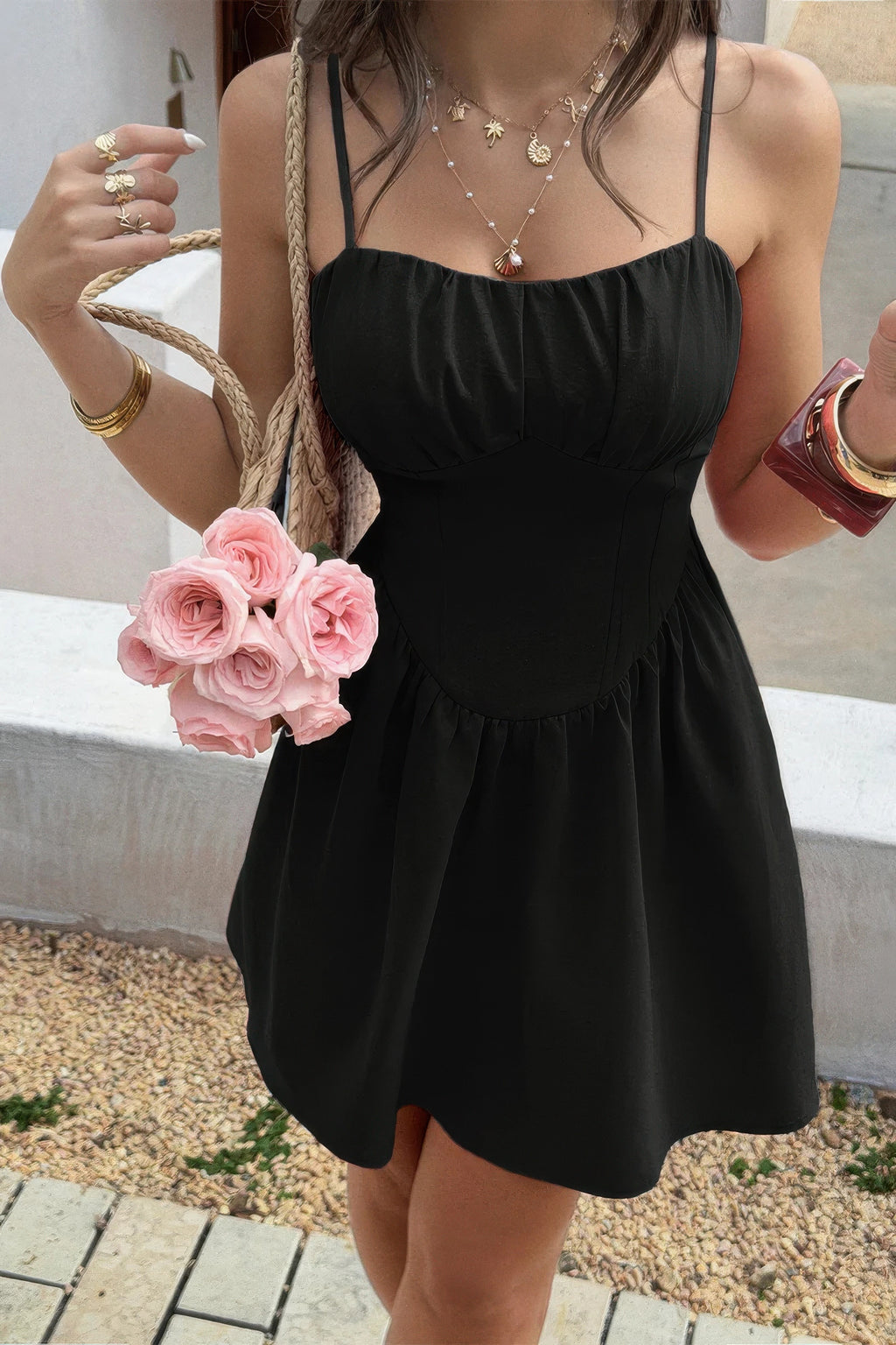 Soft Power Corset Mini Dress in black, front view with spaghetti straps and gathered bust