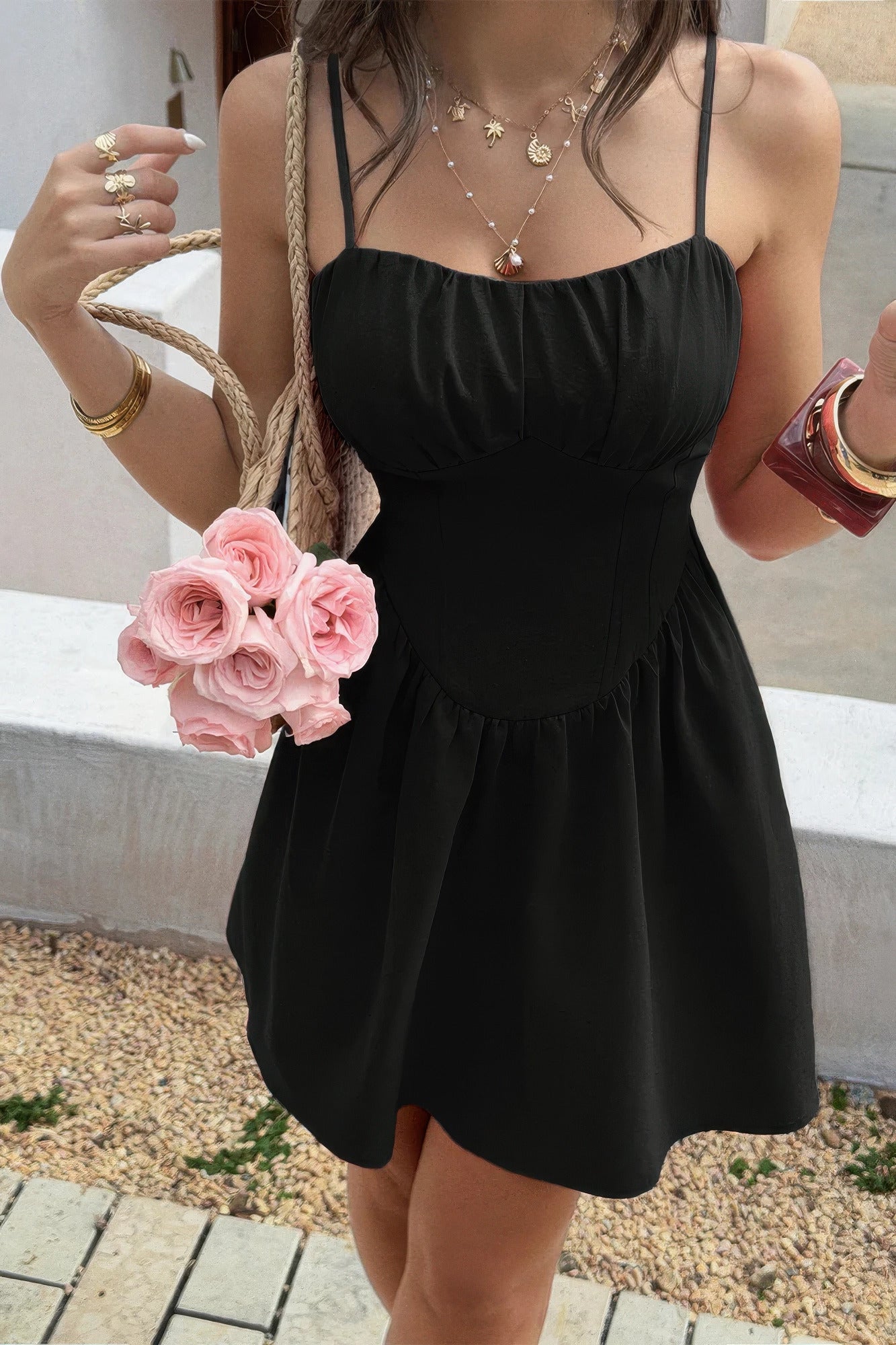 Soft Power Corset Mini Dress in black, front view with spaghetti straps and gathered bust