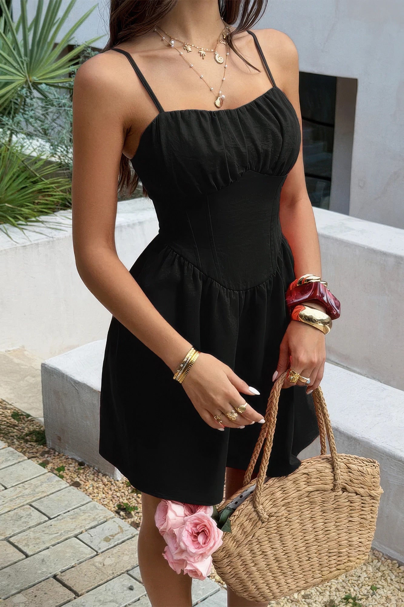 Soft Power Corset Mini Dress in black, side view of fitted basque waist and gathered skirt