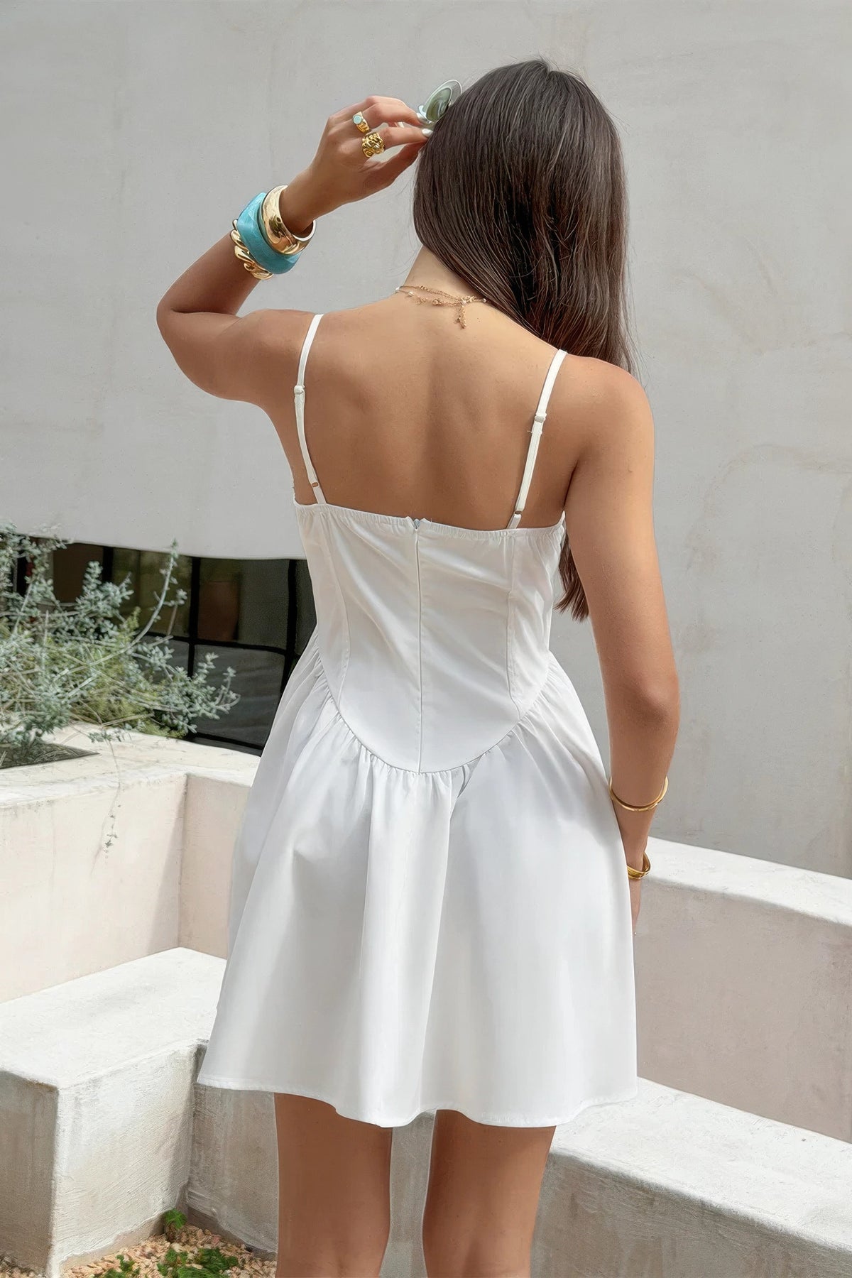 Soft Power Corset Mini Dress in white, back view with center zipper