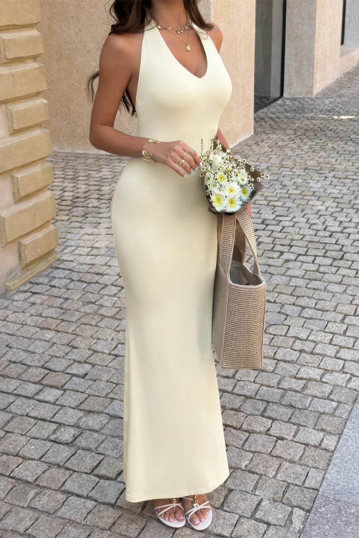 Yellow Sunlit Command halter maxi dress, front three-quarter view