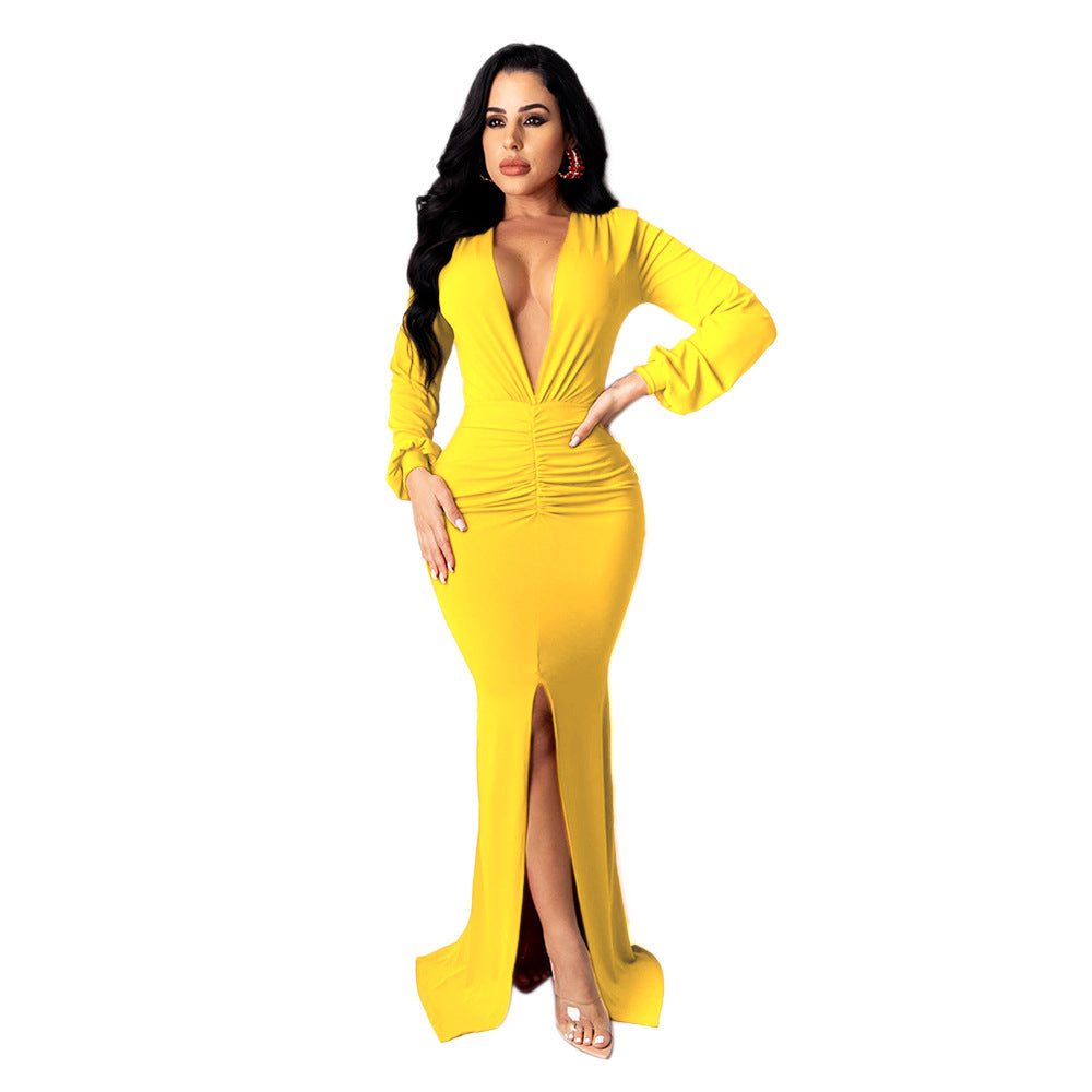Full-length front view of an adult model wearing the yellow Spotlight Status Plunge Maxi Dress.