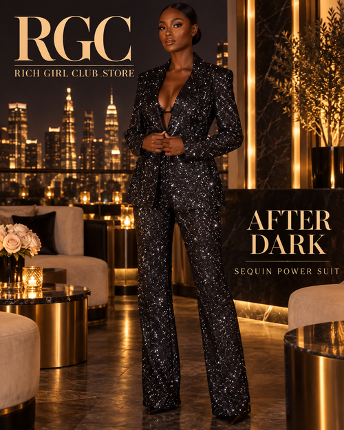 Confident adult model wearing the black After Dark Sequin Power Suit in a luxury penthouse campaign.