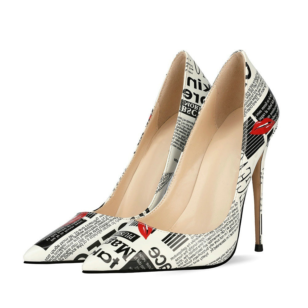 Headline newspaper-print pointed stiletto pumps three-quarter view
