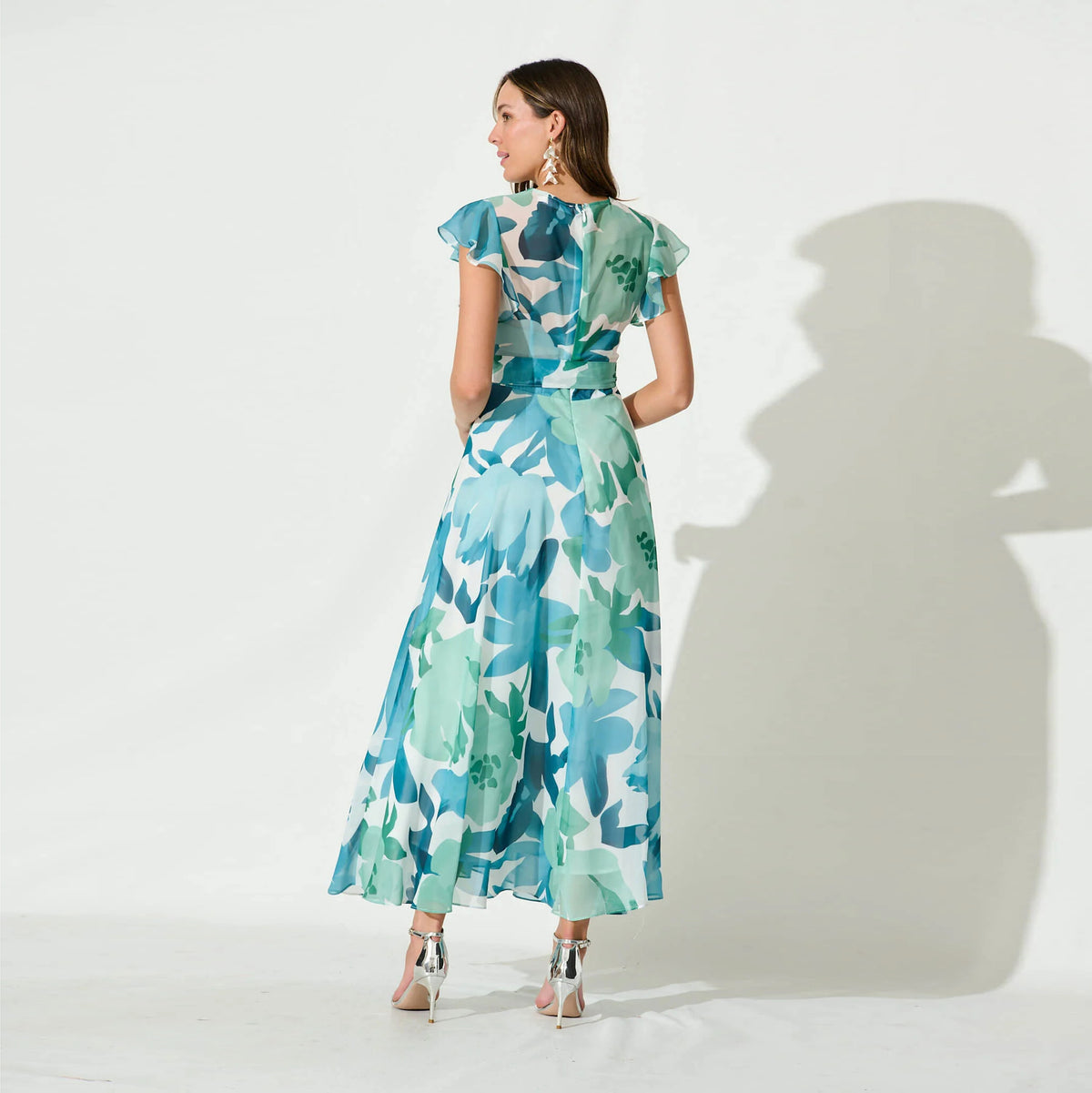 Petal Waltz light blue botanical maxi dress, closed high-back view
