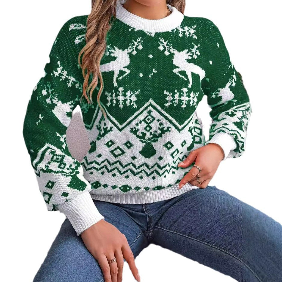 Adult model wearing the green and white Merry Main Character Reindeer Sweater, seated front view.