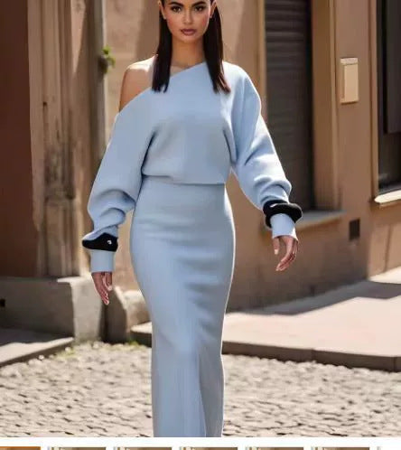Adult model wearing the sky blue Shoulder Kiss Column Dress outdoors, front view.