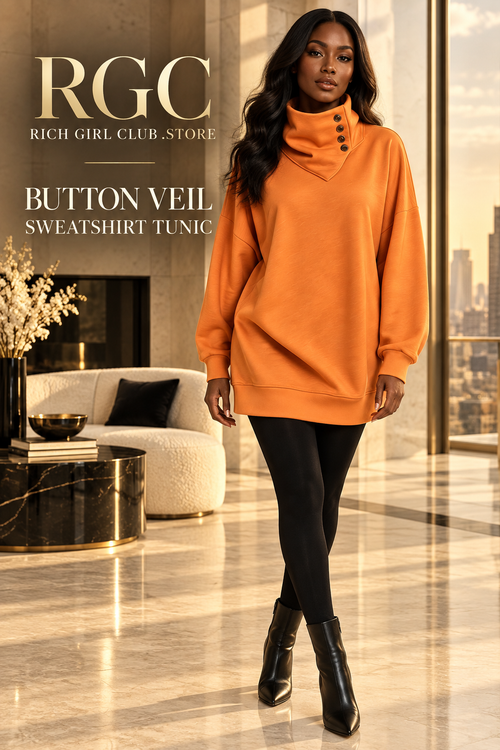 Adult model wearing the orange Button Veil Sweatshirt Tunic in a luxury RGC penthouse campaign.