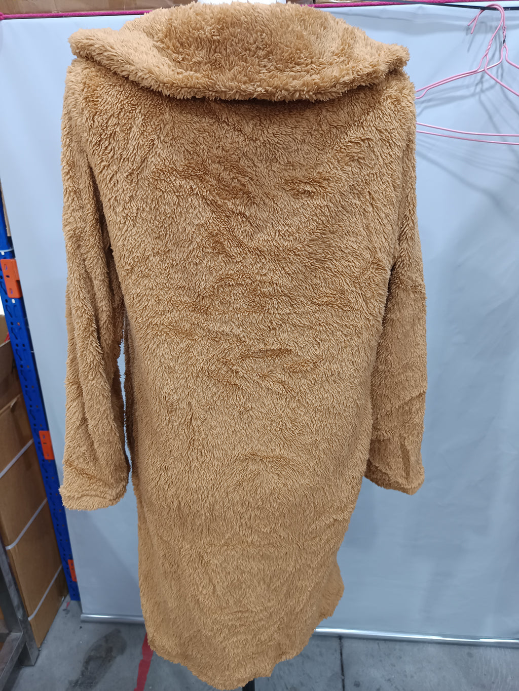 Camel plush longline jacket on a mannequin, rear view.