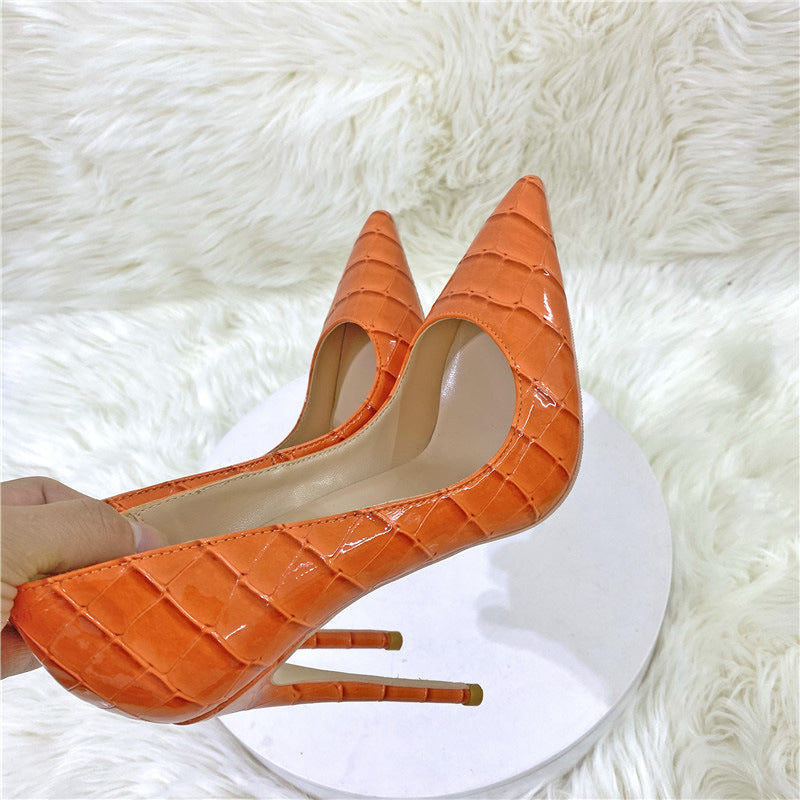 Orange embossed pointed stiletto pumps top and heel detail