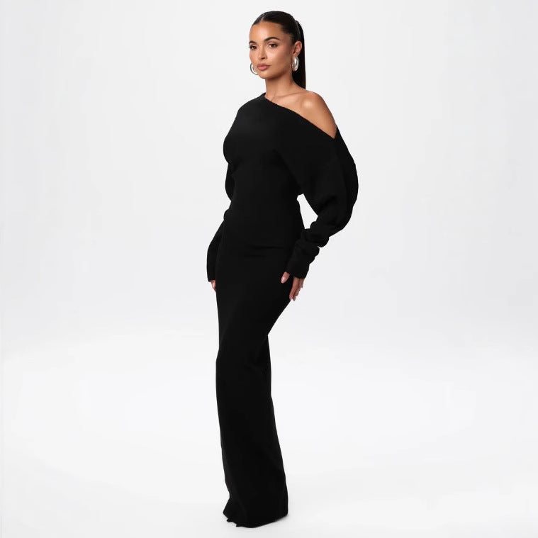 Adult model wearing the black Shoulder Kiss Column Dress, full-length studio view.