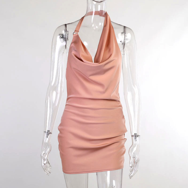 Front view of the Champagne Hour pink satin halter mini dress on a clear mannequin