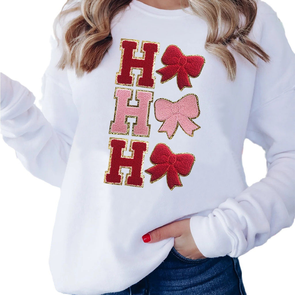 Beige embroidered pullover shown from the front on a white background.