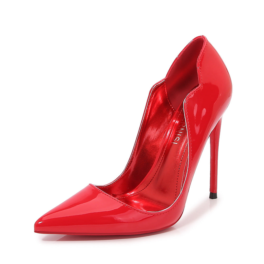 Red glossy Scarlet Sole Authority Pump in three-quarter view with sharp pointed toe, wavy topline and slim stiletto heel