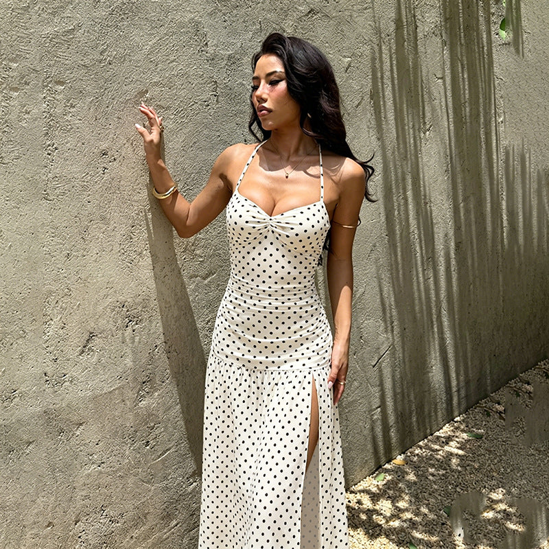 Close front view of the Main Character white polka-dot halter maxi dress and gathered bodice