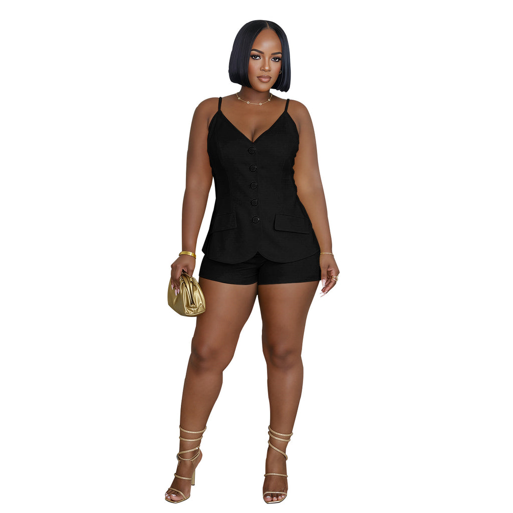 Model wearing black Boardroom Heat sleeveless button-front top and matching shorts, front view on white background