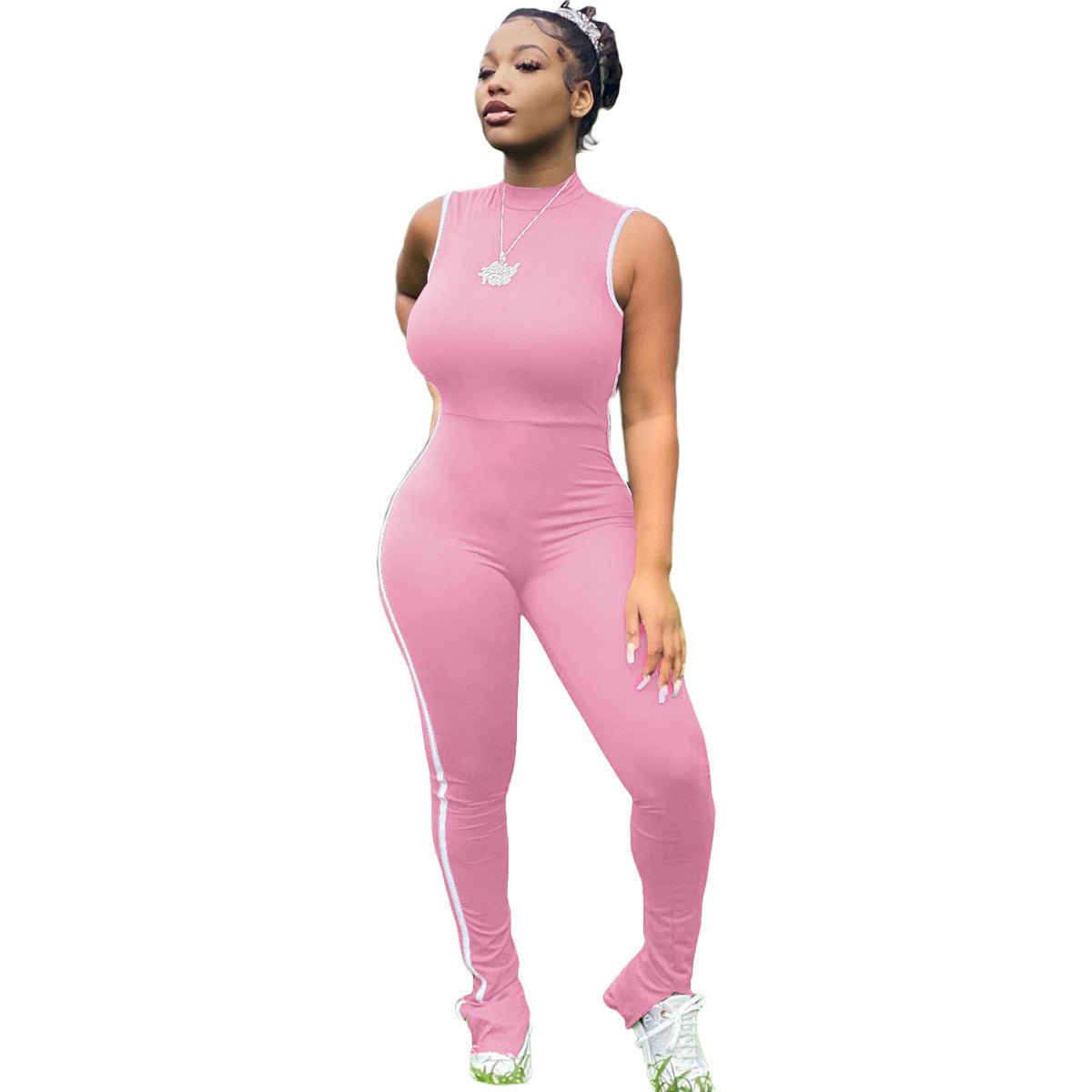 Adult model wearing the pink Sculpt Mode striped sleeveless jumpsuit, front view