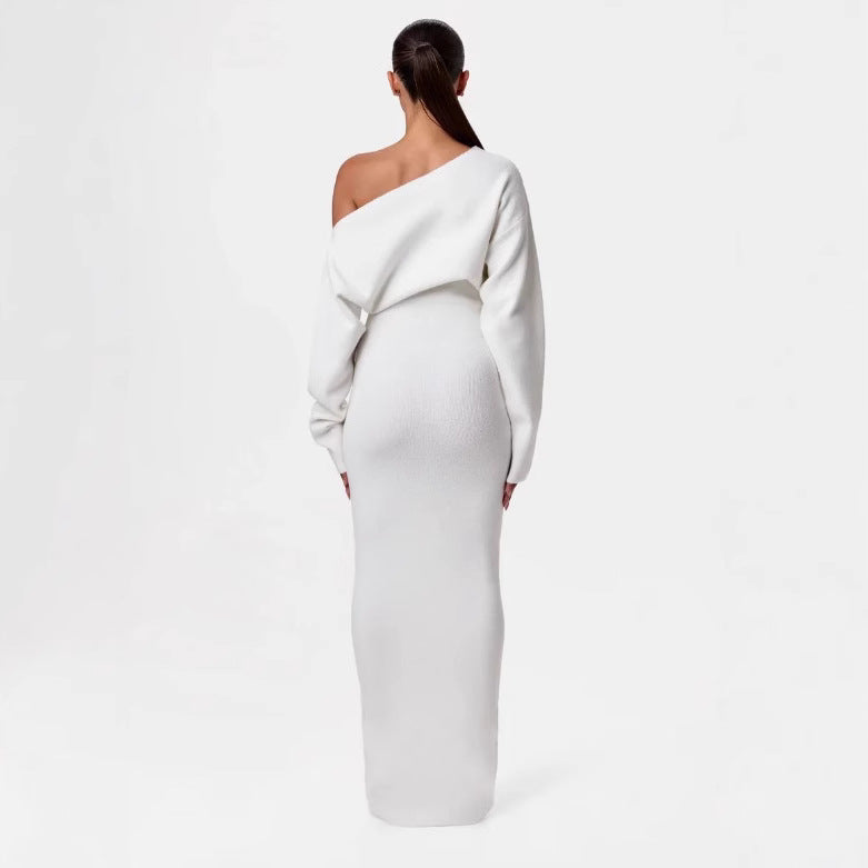 Adult model wearing the white Shoulder Kiss Column Dress, back view.