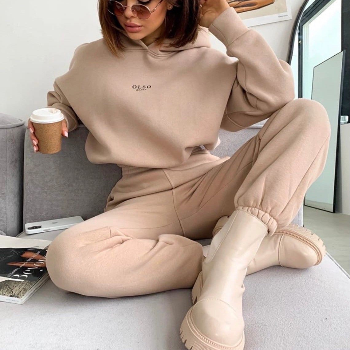 Dark khaki Soft Life hooded lounge set seated front view