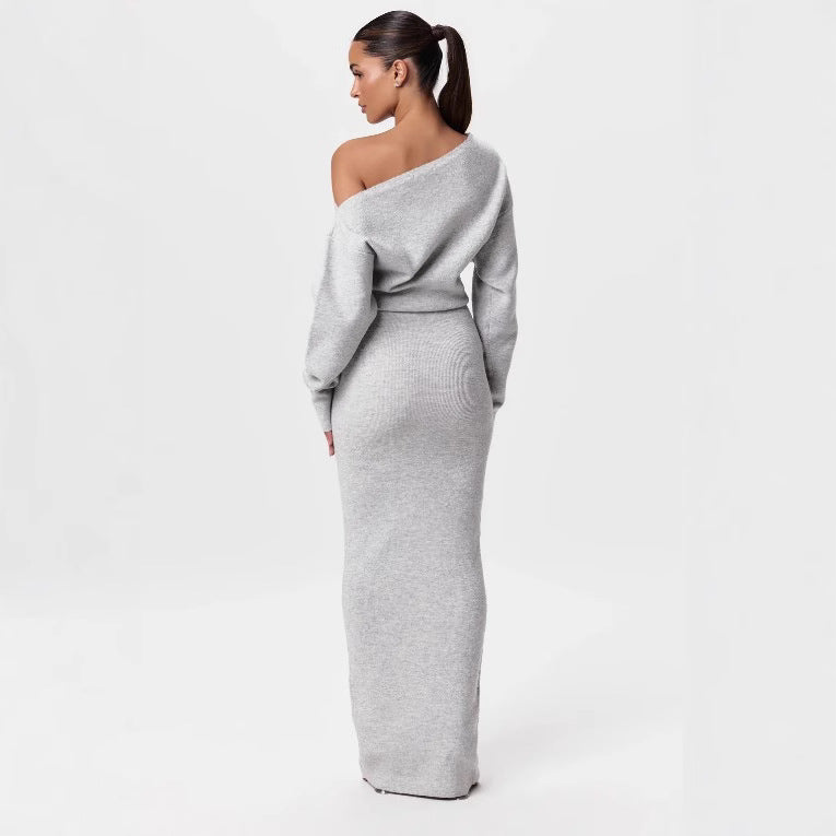 Adult model wearing the light gray Shoulder Kiss Column Dress, back view.