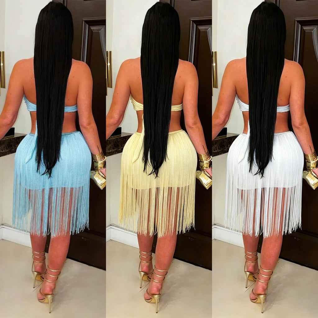 Adult model shown from the back wearing the Fringe Benefits Mini Dress in blue, yellow, and white color views.