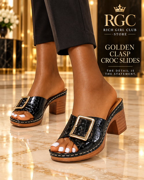 Close-up RGC campaign of an adult model wearing black Golden Clasp Croc Slides.