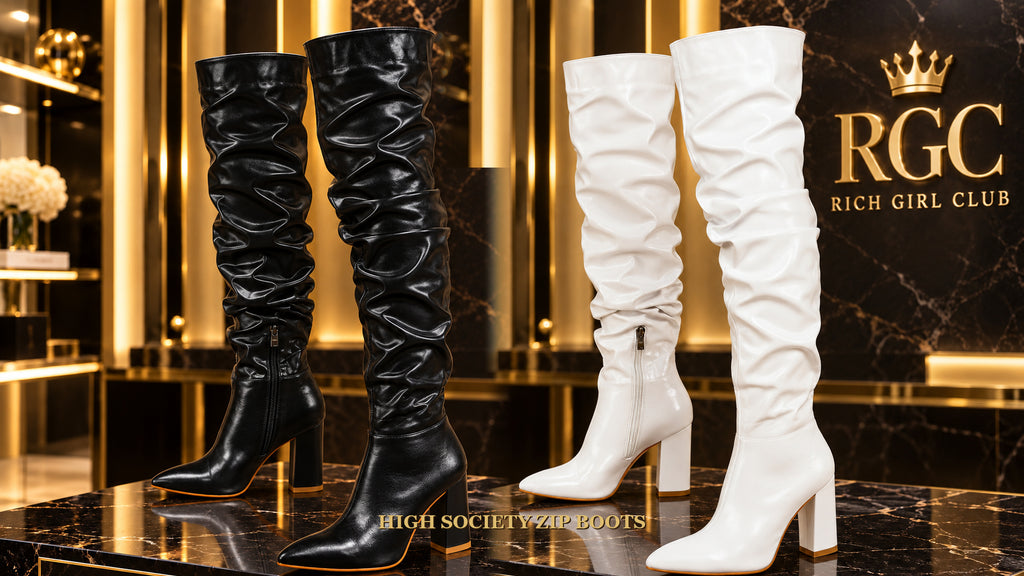 High Society Zip Boots in Black and White displayed together in the Rich Girl Club boutique