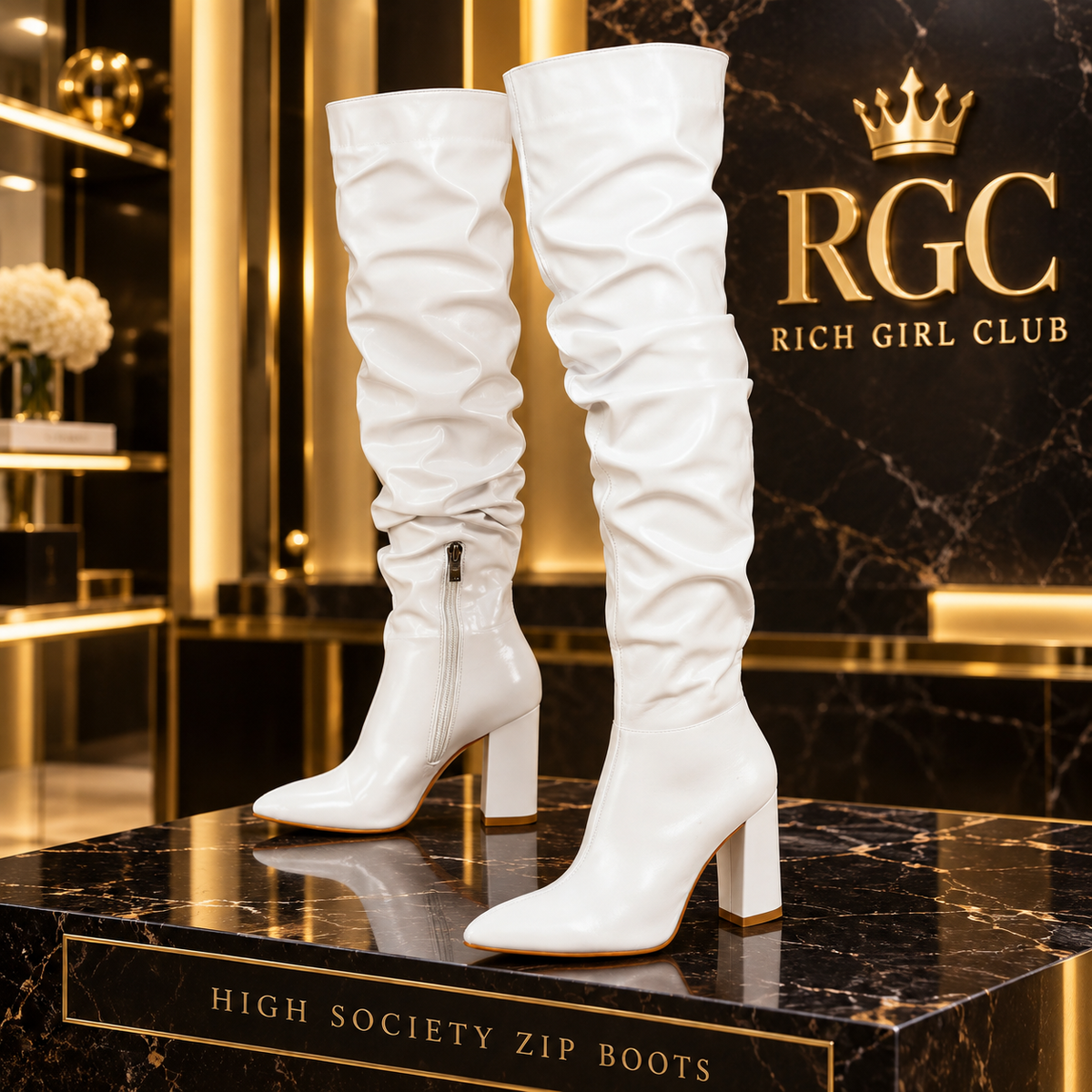 High Society Zip Boots in White displayed as a matching pair in the Rich Girl Club boutique