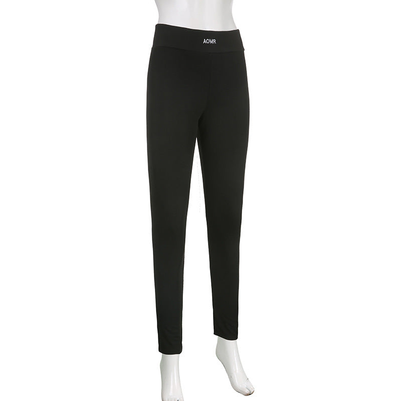 Black high-rise long pants displayed on a mannequin, front view.