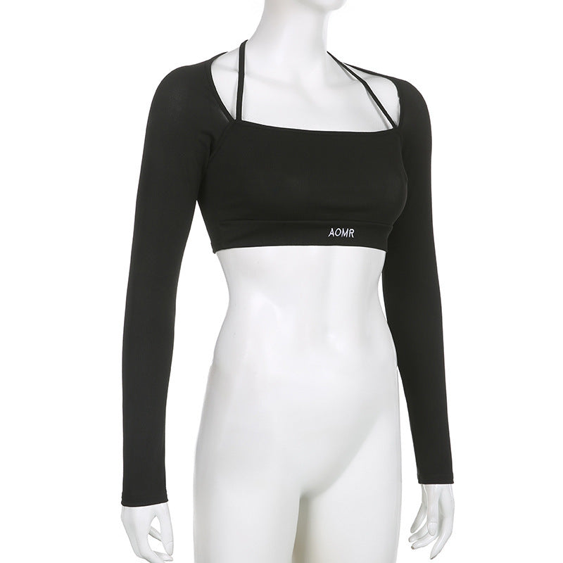 Black long-sleeve crop top on mannequin, angled front detail