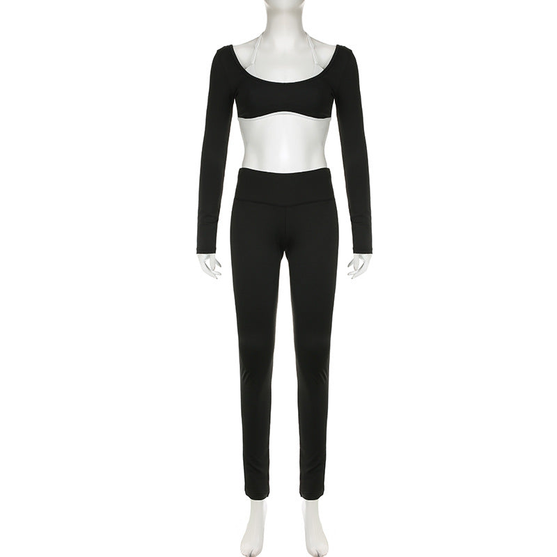 Black crop top and matching long pants on mannequin, front and back comparison