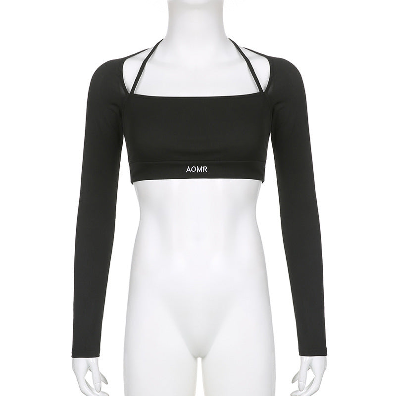 Black long-sleeve crop top on mannequin, straight front view