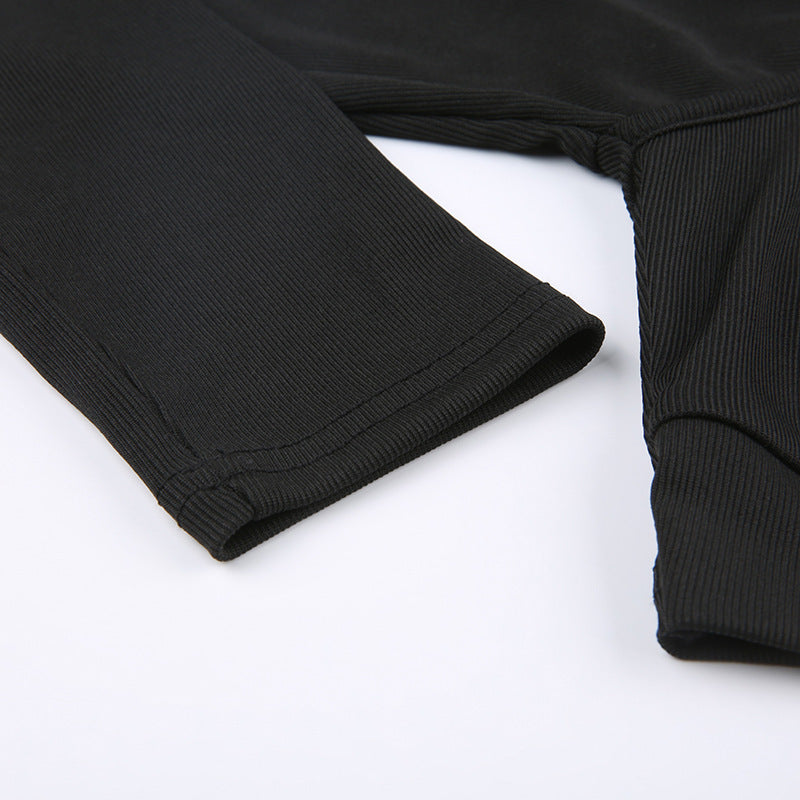 Close-up of black sleeve cuff seam