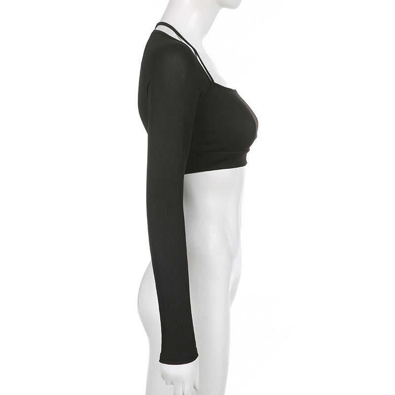 Black long-sleeve crop top on mannequin, full side view