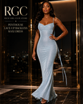 Penthouse Lace-Up Backless Maxi Dress in light blue on a confident adult model entering a luxury penthouse