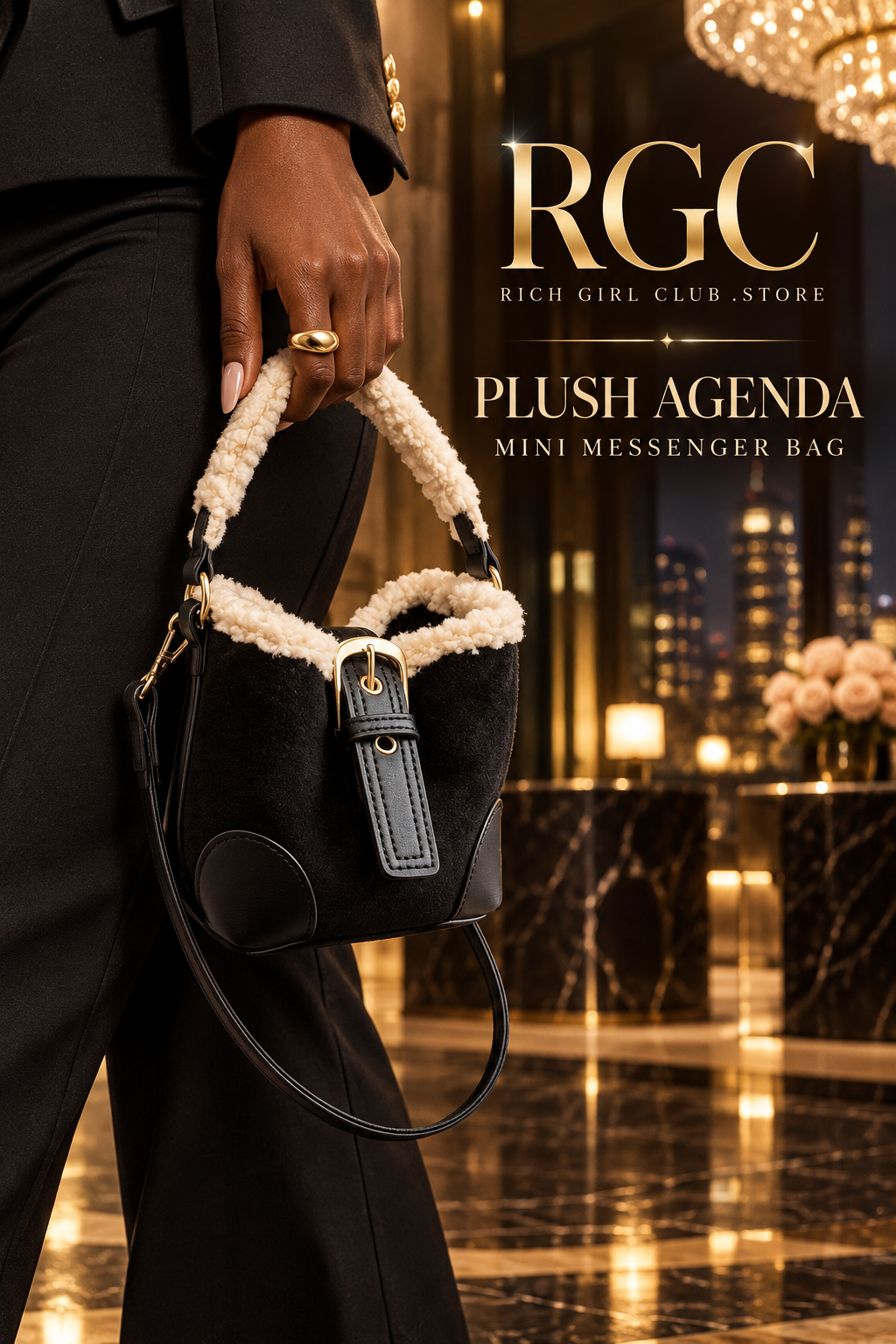 Black Plush Agenda Mini Messenger Bag held close against a tailored black outfit in a champagne-lit hotel lobby, RGC campaign hero.
