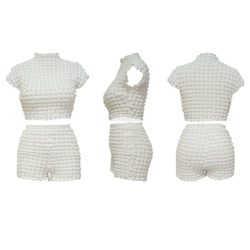 White bubble-texture crop top and matching shorts shown in product-only front, side, and back views.