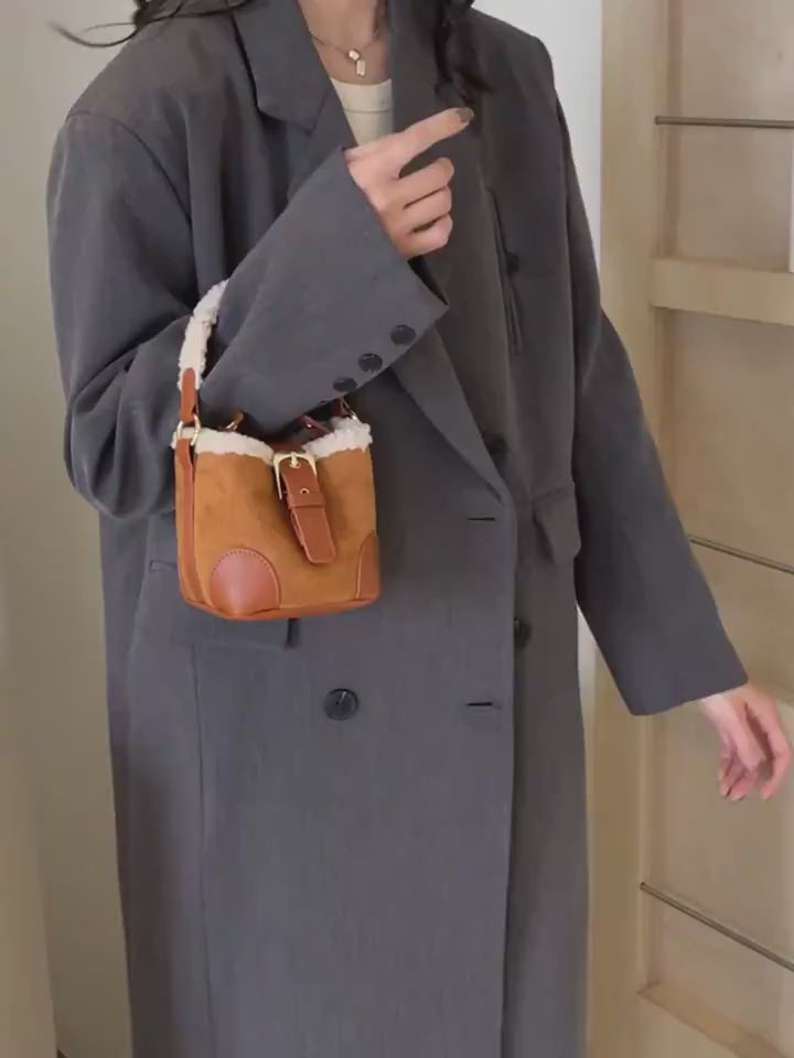 Video presenting the Plush Agenda Mini Messenger Bag in a product display.