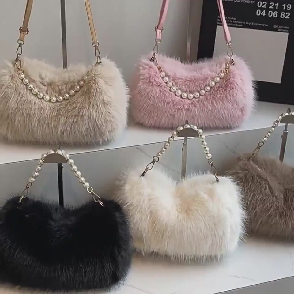 Video showing the Plush Power Pearl-Style Shoulder Bag strap and pearl-style front detail.