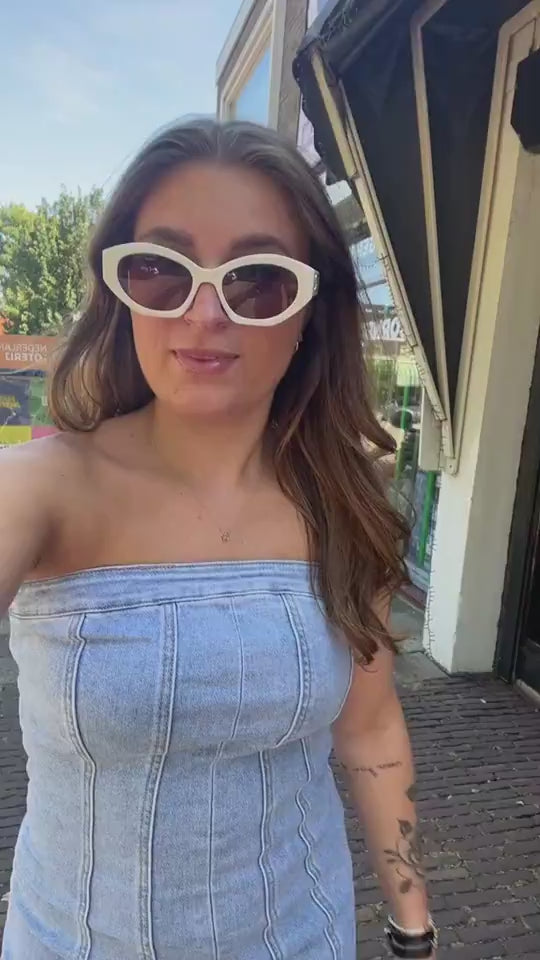 Penthouse Denim Tube Mini Dress supplier video 3 showing garment fit and movement