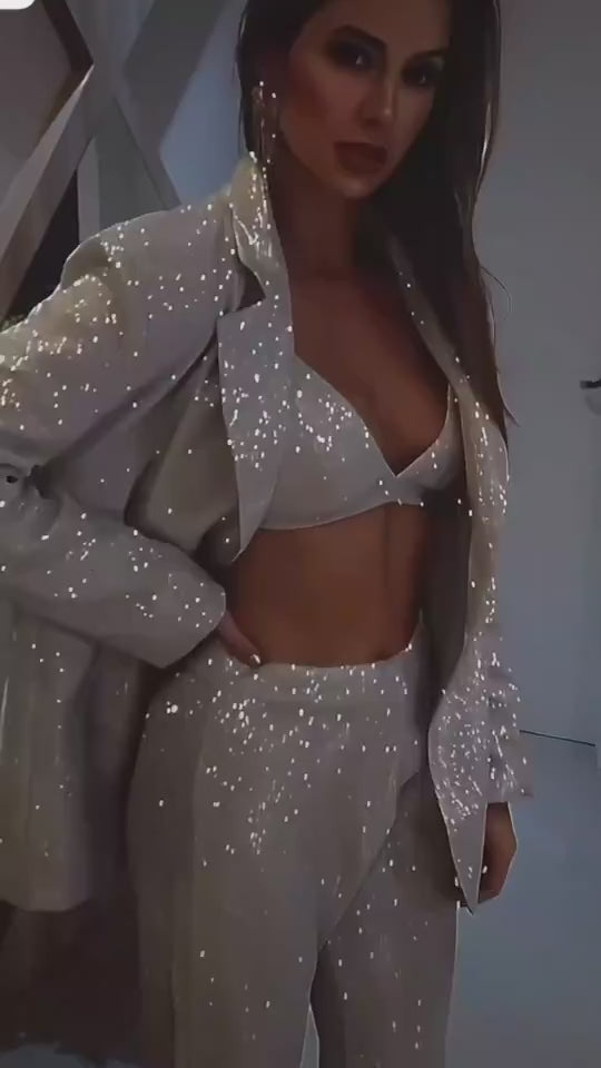 Video view of the After Dark Sequin Power Suit showing its sparkling three-piece styling.