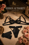 Ribbon Authority Lingerie Set luxury RGC campaign flat lay with the black bra, matching panty, and two leg rings.
