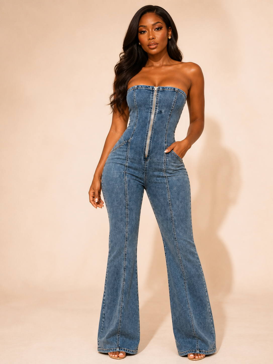 Adult model wearing the blue strapless zip-front wide-leg Velvet Desire denim jumpsuit